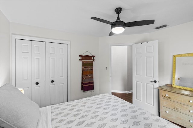 1882 E Monopoly Loop, Inverness, FL 34453 - bedroom with a closet, ceiling fan, and wood finished floors