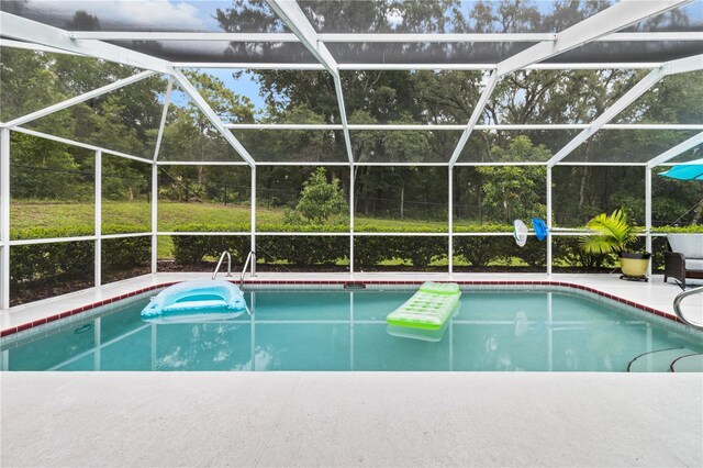 1882 E Monopoly Loop, Inverness, FL 34453 - outdoor pool with a lanai and a patio area
