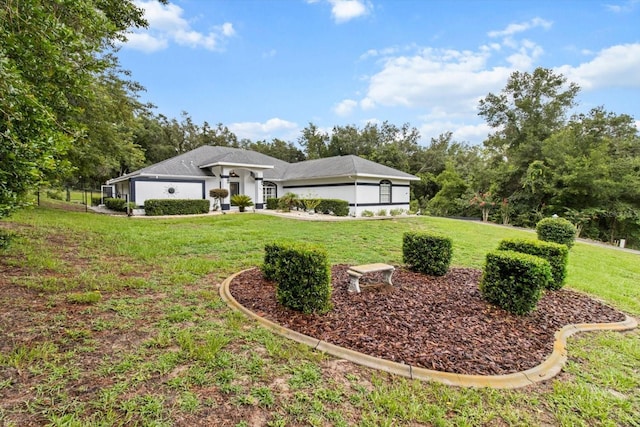 1882 E Monopoly Loop, Inverness, FL 34453 - view of front of house featuring a front lawn