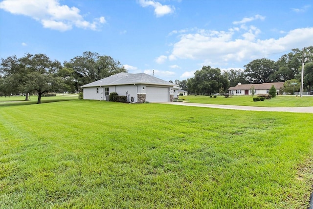 837 E Epsom Ct, Hernando, FL 34442 - view of side of home with driveway, stone siding, an attached garage, and a yard