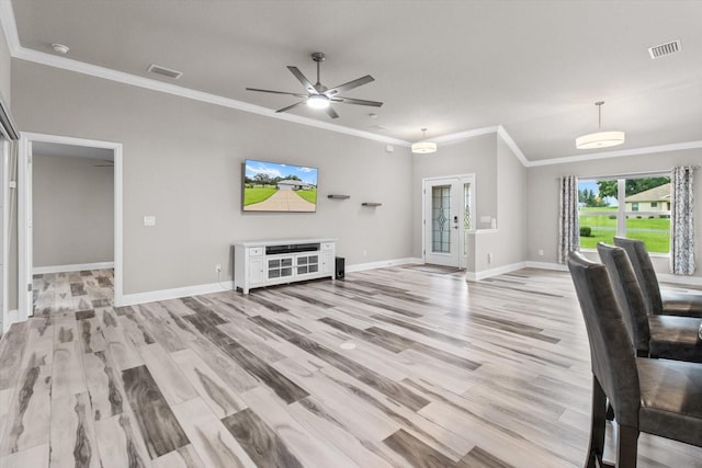 837 E Epsom Ct, Hernando, FL 34442 - unfurnished living room with ornamental molding, light wood finished floors, and a ceiling fan