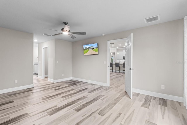 837 E Epsom Ct, Hernando, FL 34442 - empty room with light wood-style flooring and ceiling fan