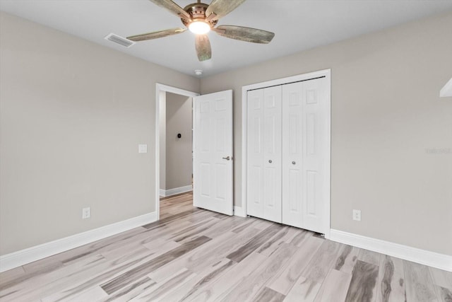 837 E Epsom Ct, Hernando, FL 34442 - unfurnished bedroom featuring light wood-type flooring, a closet, and ceiling fan