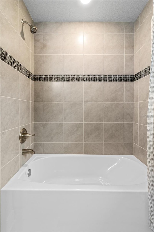 837 E Epsom Ct, Hernando, FL 34442 - full bathroom with shower / tub combination and a textured ceiling