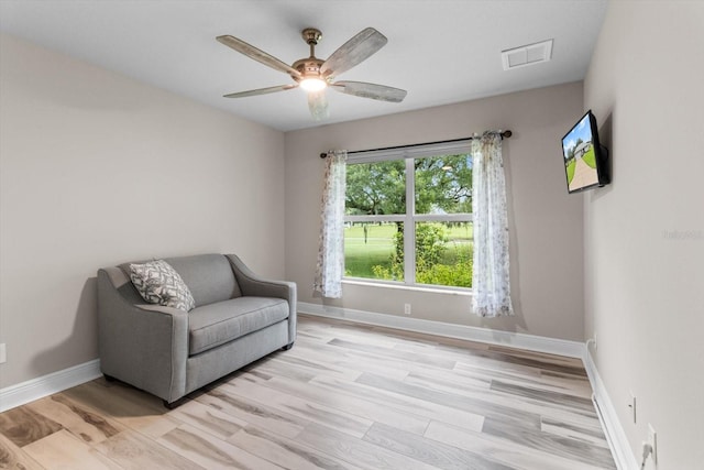 837 E Epsom Ct, Hernando, FL 34442 - living area featuring a ceiling fan and light wood finished floors