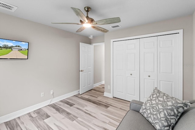 837 E Epsom Ct, Hernando, FL 34442 - living area featuring a ceiling fan and light wood-style flooring
