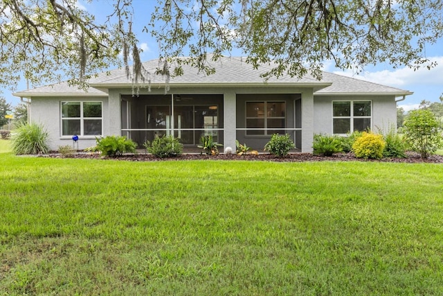837 E Epsom Ct, Hernando, FL 34442 - back of property featuring stucco siding, a yard, and a sunroom