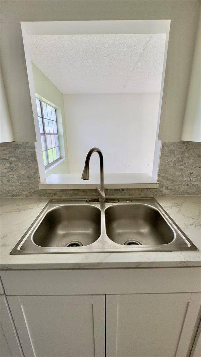 15091 SW 35th Cir, Ocala, FL 34473 - kitchen view of a textured ceiling and tasteful backsplash
