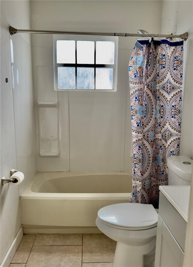 15091 SW 35th Cir, Ocala, FL 34473 - bathroom with vanity, tile patterned floors, and shower / bath combo with shower curtain