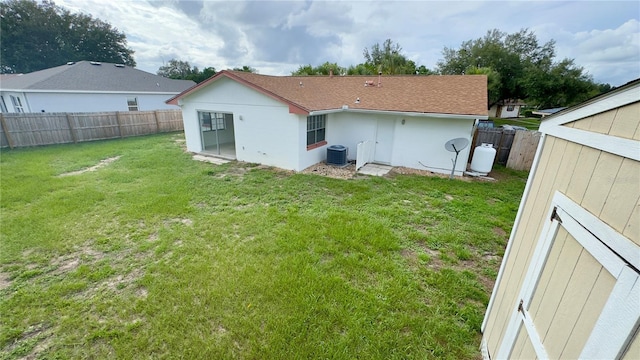 15091 SW 35th Cir, Ocala, FL 34473 - rear view of house with a fenced backyard