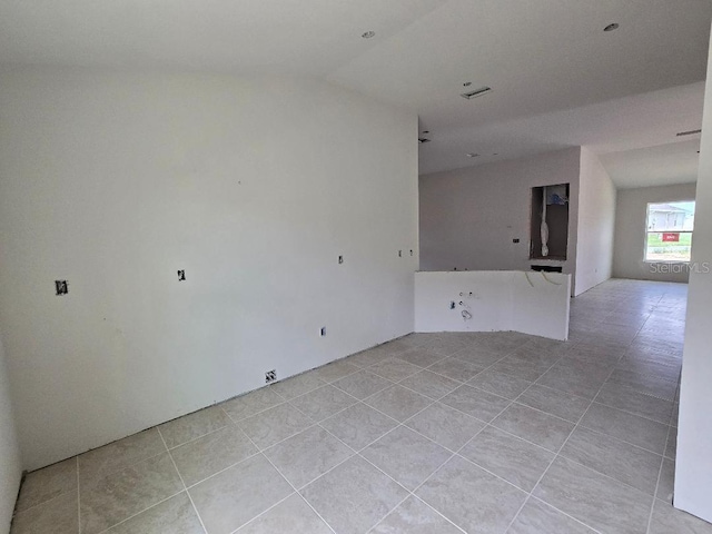 455 W Rexford Dr, Beverly Hills, FL 34465 - empty room featuring light tile patterned floors and lofted ceiling