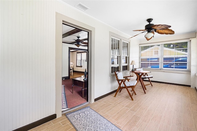 11 62nd St, Yankeetown, FL 34498 - sunroom featuring wood finished floors and crown molding