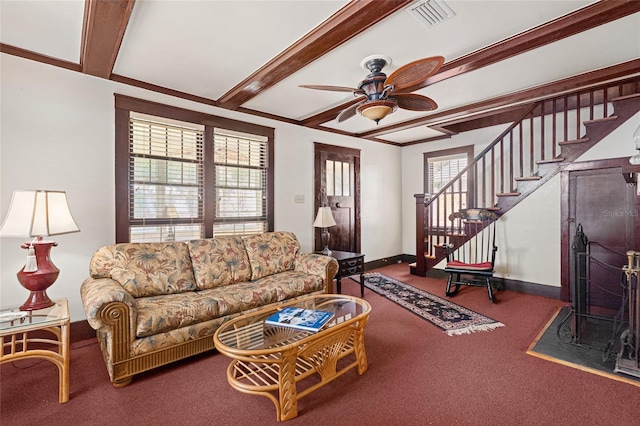 11 62nd St, Yankeetown, FL 34498 - living area with carpet, plenty of natural light, a ceiling fan, stairs, and beamed ceiling