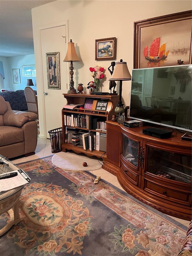8552 SW 92nd Ln Unit C, Ocala, FL 34481 - living room with a textured ceiling and tile patterned flooring