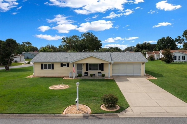 10492 SE 178th St, Summerfield, FL 34491 - ranch-style home featuring a porch, a garage, a front yard, and driveway