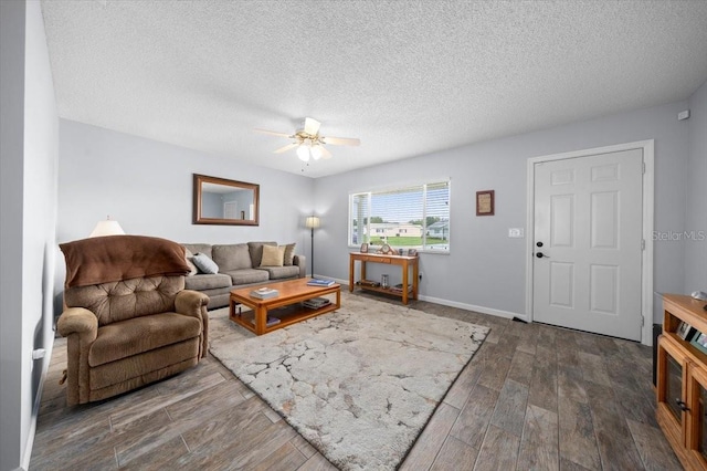 10492 SE 178th St, Summerfield, FL 34491 - living room with wood finished floors, a ceiling fan, and a textured ceiling
