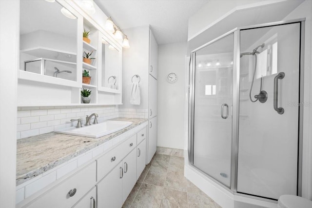 10492 SE 178th St, Summerfield, FL 34491 - bathroom featuring vanity, a stall shower, and backsplash
