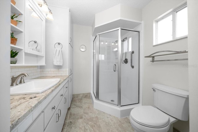 10492 SE 178th St, Summerfield, FL 34491 - full bathroom with vanity, a shower stall, backsplash, and a textured ceiling