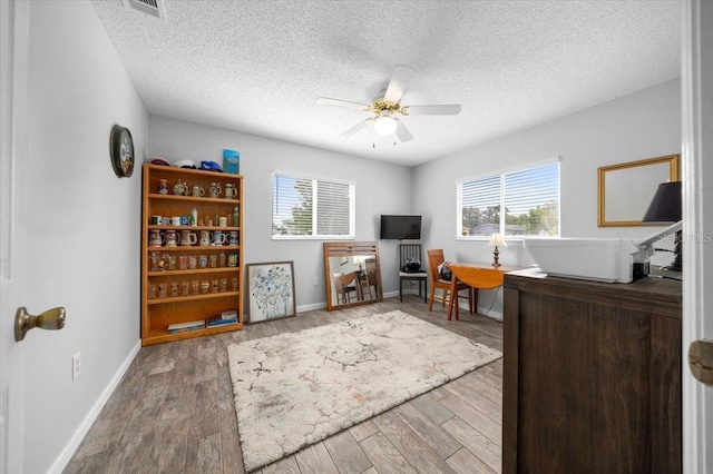 10492 SE 178th St, Summerfield, FL 34491 - office space with ceiling fan, wood finished floors, and a textured ceiling