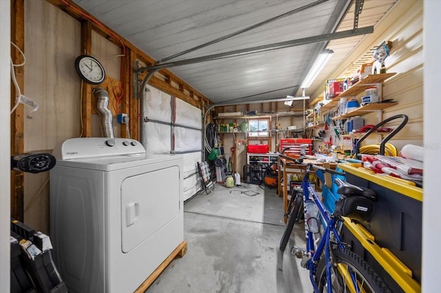 10492 SE 178th St, Summerfield, FL 34491 - garage featuring washer / dryer and a workshop area