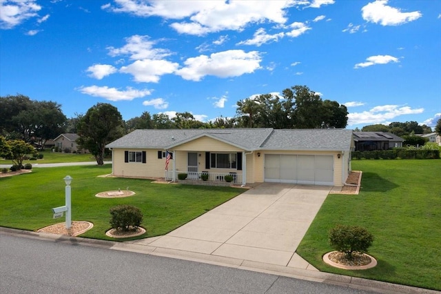 10492 SE 178th St, Summerfield, FL 34491 - ranch-style home with covered porch, a garage, a front lawn, and concrete driveway