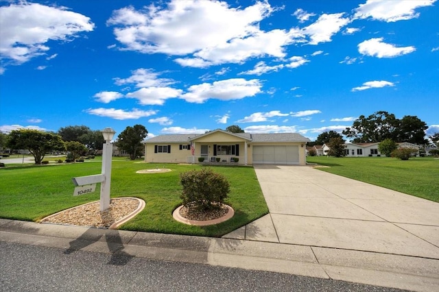 10492 SE 178th St, Summerfield, FL 34491 - single story home with a garage, a front lawn, and concrete driveway