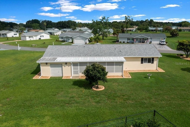 10492 SE 178th St, Summerfield, FL 34491 - view of front of house with a residential view, a front lawn, and a sunroom