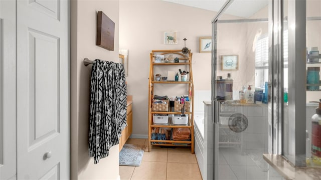 705 Guava Dr, Saint Augustine, FL 32095 - bathroom with a shower stall and tile patterned flooring