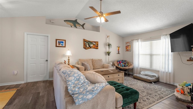705 Guava Dr, Saint Augustine, FL 32095 - living room featuring ceiling fan, wood finished floors, vaulted ceiling, and a textured ceiling