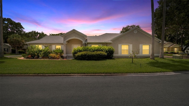 705 Guava Dr, Saint Augustine, FL 32095 - single story home with a front lawn and stucco siding