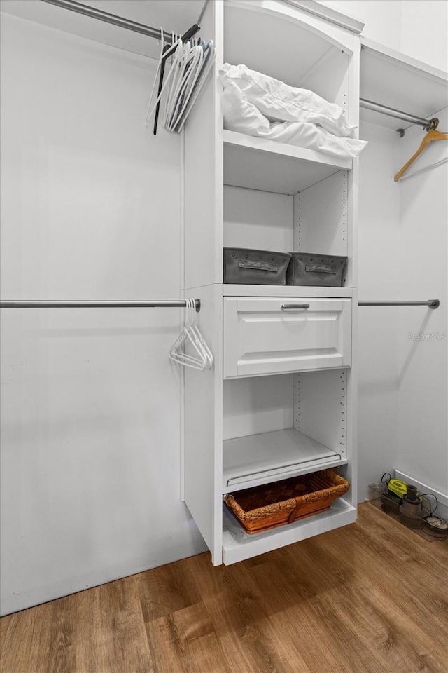 5328 Riverside Dr, Yankeetown, FL 34498 - spacious closet featuring wood finished floors