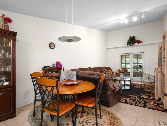 210 E Glassboro Ct Unit 6A, Hernando, FL 34442 - dining room with light tile patterned floors and track lighting