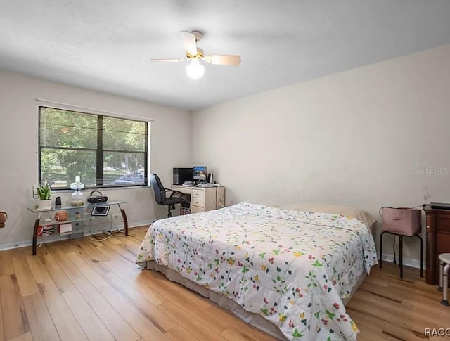 210 E Glassboro Ct Unit 6A, Hernando, FL 34442 - bedroom with wood finished floors, a ceiling fan, and a desk