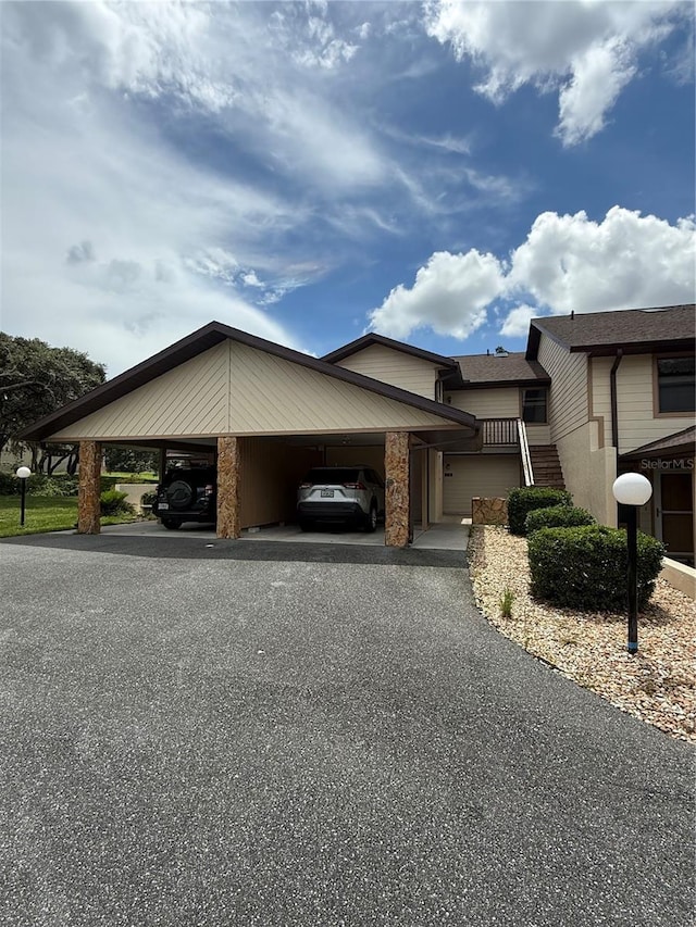 210 E Glassboro Ct Unit 6A, Hernando, FL 34442 - view of front of property with asphalt driveway and a carport