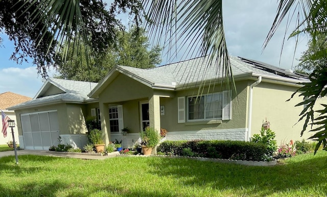 9771 SW 97th Ln, Ocala, FL 34481 - ranch-style home featuring an attached garage, stucco siding, a front lawn, and concrete driveway