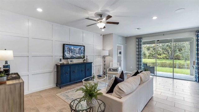 4253 SW 54th Street Rd, Ocala, FL 34474 - living area with ceiling fan, a decorative wall, and recessed lighting