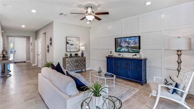 4253 SW 54th Street Rd, Ocala, FL 34474 - living room featuring a decorative wall, a ceiling fan, and recessed lighting