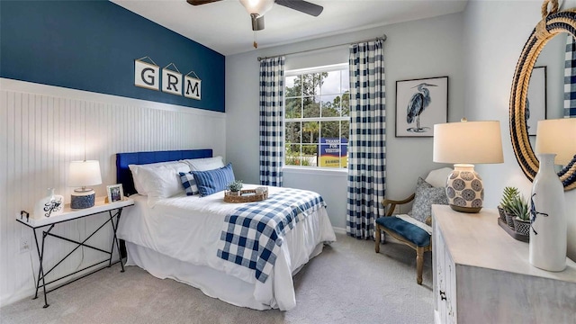 4253 SW 54th Street Rd, Ocala, FL 34474 - bedroom featuring a wainscoted wall, carpet flooring, and a ceiling fan