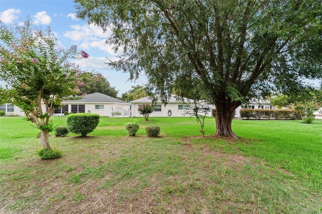 9117 SW 93rd Cir, Ocala, FL 34481 - view of grassy yard