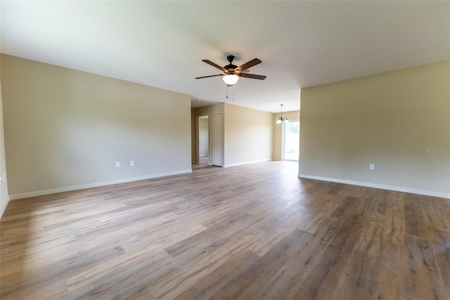 21 Locust Loop Radl, Ocala, FL 34472 - spare room with a ceiling fan and wood finished floors