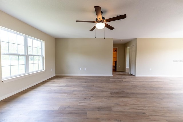 21 Locust Loop Radl, Ocala, FL 34472 - spare room with ceiling fan and wood finished floors