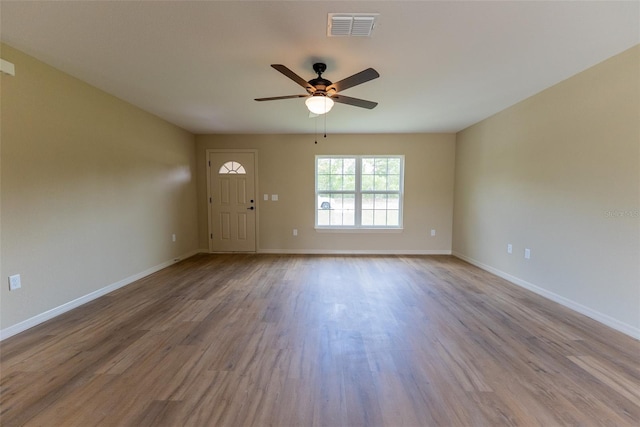 21 Locust Loop Radl, Ocala, FL 34472 - unfurnished room with ceiling fan and wood finished floors