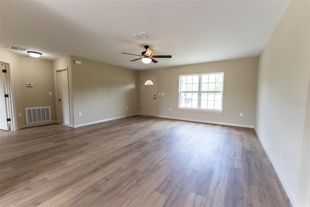 21 Locust Loop Radl, Ocala, FL 34472 - spare room with a ceiling fan and wood finished floors