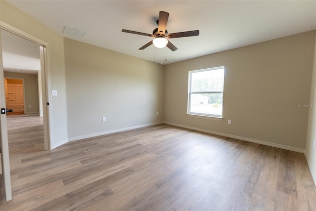 21 Locust Loop Radl, Ocala, FL 34472 - spare room with light wood-style flooring and a ceiling fan