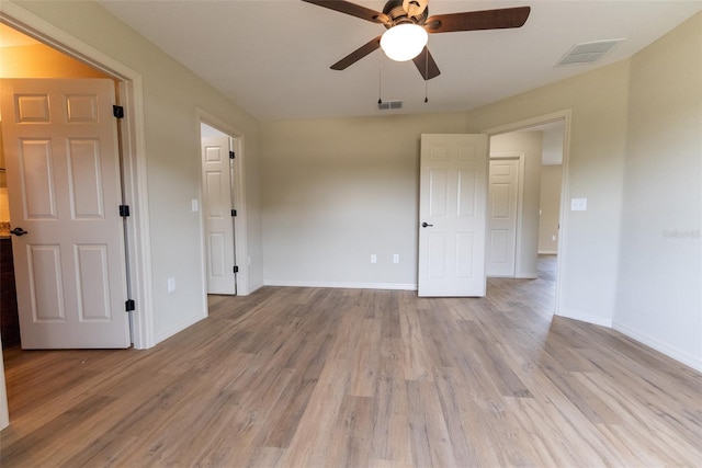 21 Locust Loop Radl, Ocala, FL 34472 - empty room featuring a ceiling fan and light wood-style floors