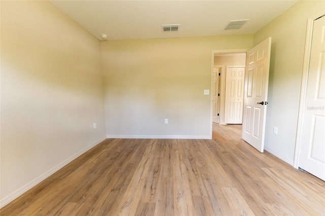 21 Locust Loop Radl, Ocala, FL 34472 - unfurnished room with light wood-style flooring and baseboards