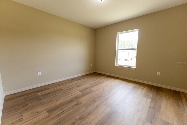 21 Locust Loop Radl, Ocala, FL 34472 - unfurnished room featuring wood finished floors and baseboards