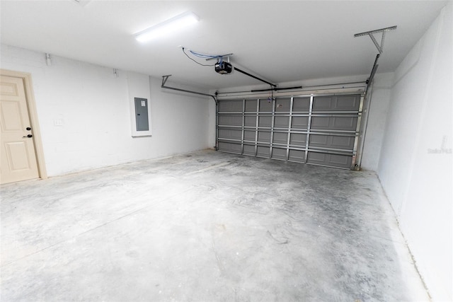 21 Locust Loop Radl, Ocala, FL 34472 - garage with electric panel and a garage door opener