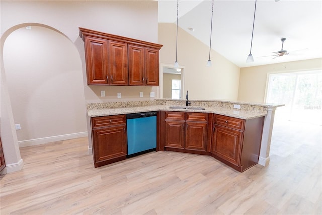 45 Pecan Course Loop, Ocala, FL 34472 - kitchen with dishwashing machine, light wood-style floors, a peninsula, light stone counters, and high vaulted ceiling