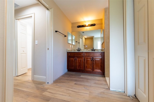 45 Pecan Course Loop, Ocala, FL 34472 - bathroom with wood finished floors and double vanity